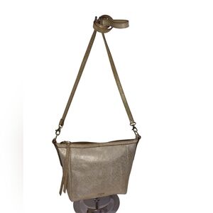 Fossil Gold Crossbody Bag with Sleek Design